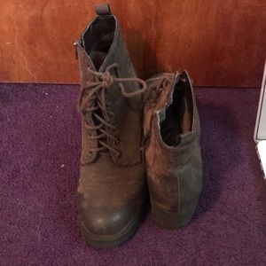 Brown lace up high heeled ankle boots